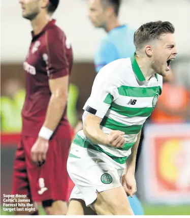  ??  ?? Super Hoop: Celtic’s James Forrest hits the target last night