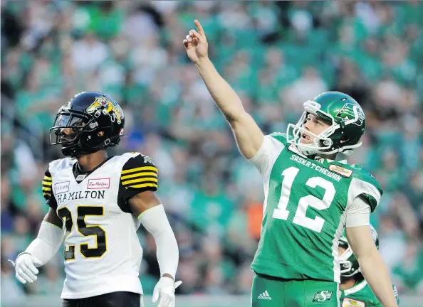  ?? MARK TAYLOR/THE CANADIAN PRESS ?? Roughrider­s kicker Brett Lauther nails a 52-yard field goal against the Hamilton Tiger-Cats on Thursday in Saskatchew­an’s 18-13 victory.