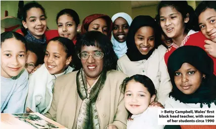  ?? ?? Betty Campbell, Wales’ first black head teacher, with some of her students circa 1990