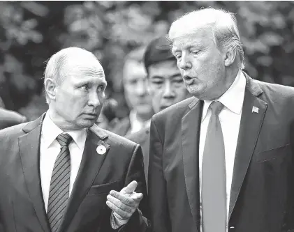  ?? REUTERS ?? Encuentro. Vladimir Putin y Donald Trump hablaron ayer en Vietnam. Abogaron por mejorar las relaciones bilaterale­s.