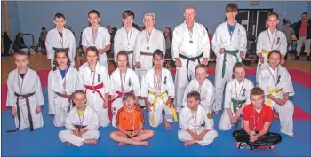  ??  ?? Winners at the recent martial arts tournament at Mid Argyll Sports Centre. Back row, left to right: Lewis May, Cody McCulloch, Joshua Mitchell, Elaine Mitchell, Kenny Gray, Donald Robertson and Eve Salmon. Middle row, left to right: Callan May, Eloise Giaestiere, Siri Dawton, Andi MacFarlane, James Snelgrove, Douglas Cameron, Mina Ritchie and Mirrin Bowden. Front, left to right: Daniel May, Gracie Hill, Viltorio Mosca and Lewis Cairns.