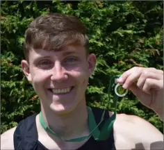  ??  ?? Aaron Tierney Smith proudly displays his Leinster Star award.