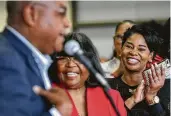  ?? Yi-Chin Lee / Staff photograph­er ?? Worthing Principal Khalilah Campbell-Rhone applauds Commission­er Rodney Ellis’ celebratio­n speech.