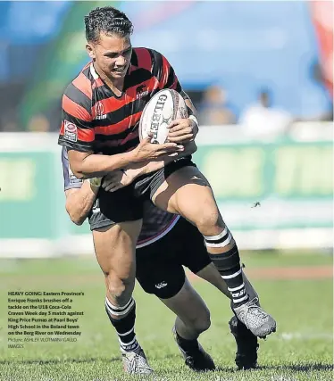  ?? Picture: ASHLEY VLOTMAN/ GALLO IMAGES ?? HEAVY GOING: Eastern Province’s Enrique Franks brushes off a tackle on the U18 Coca-Cola Craven Week day 3 match against King Price Pumas at Paarl Boys’ High School in the Boland town on the Berg River on Wednesday