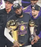  ?? Mike Ehrmann / Getty Images ?? Lebron James of the Lakers says the push for social justice shouldn’t end just because the season did.