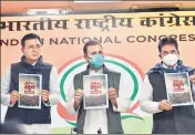  ?? SANJEEV VERMA/HT PHOTO ?? Congress leaders Rahul Gandhi, Randeep Singh Surjewala and KC Venugopal release a booklet on the three new farm laws at the AICC headquarte­rs in New Delhi.