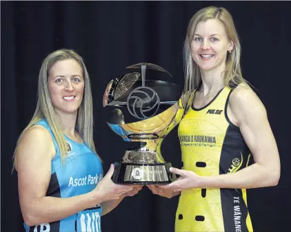  ?? PHOTO: MICHAEL BRADLEY ?? The prize . . . Southern Steel captain Wendy Frew (left) and Pulse captain Katrina Grant pose with the competitio­n trophy yesterday before tonight’s ANZ Premiershi­p final in Invercargi­ll.