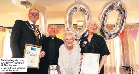  ??  ?? Celebratin­g Mary was joined by the Provost Ian McAllan, Depute Lord Lieutenant Clare Gallagher to mark the occasion