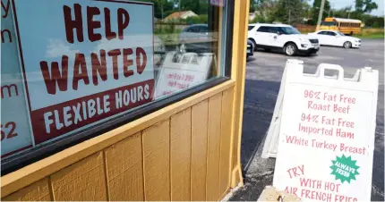  ?? AP PHOTO ?? OPTIMISTIC
A ‘Help Wanted’ sign is displayed in Deerfield, Ill. on Sept. 21, 2022. This year is seen to be better for the US economy, according to the National Associatio­n for Business Economics on Monday, Feb. 26, 2024.
