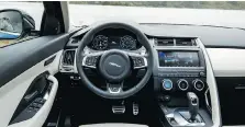  ?? JAGUAR ?? The clean cabin design of the 2018 Jaguar E-Pace mirrors the driver-focused dash layout of the F-Pace, with large, easily readable gauges.