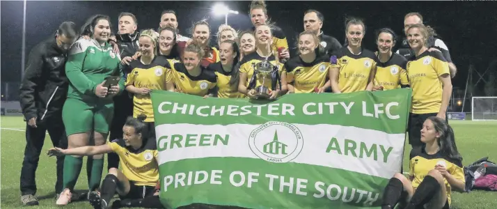  ?? PICTURES BY SHEENA BOOKER ?? The squad and their coaches celebrate with the cup – and the banner says it all: Pride of the South