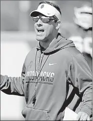  ?? NWA Democrat-Gazette/ANDY SHUPE ?? Arkansas offensive coordinato­r Dan Enos isn’t worried about his job security, but he said Monday that the speculatio­n regarding the coaching staff is tough for his family to go through.
