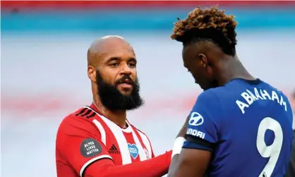  ??  ?? David McGoldrick (left) with Chelsea’s Tammy Abraham after Sheffield United’s 3-0 win at Bramall Lane. Photograph: Peter Powell/AFP/ Getty Images