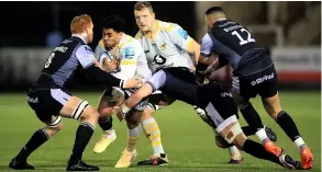  ??  ?? Wasps’ Malakai Fekitoa hit by Philip Van Der Welt, Will Welch and Luther Burrell