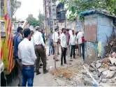  ??  ?? The GHMC North Zone and Traffic Police Marredpall­y demolishin­g illegal encroachme­nts on Saturday.