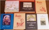  ??  ?? An sieben Büchern, in denen die Geschichte von Rain und Um gebung dokumentie­rt ist, hat Franz Müller mitgeschri­eben.