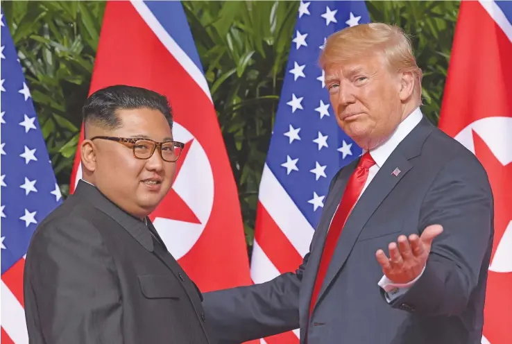 ?? Photo: Saul Loeb/AFP ?? ART OF THE DEAL: US President Donald Trump meets North Korean leader Kim Jong-un at the start of their historic US-North Korea summit on June 12, 2018.