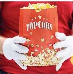  ?? FOTO:DPA ?? Endlich wieder Filme und endlich wieder Popcorn.