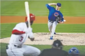  ??  ?? Chicago Cubs starter Kyle Hendricks delivers a pitch against the Washington Nationals in the third inning of Friday night’s game.