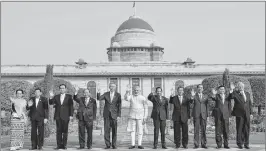  ??  ?? Prime Minister Narendra Modi with the ASEAN Heads of State/Government­s at Rashtrapat­i Bhavan, in New Delhi on Thursday.