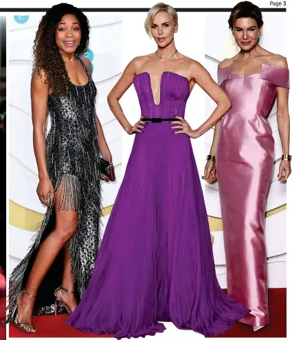  ??  ?? Purple reign: Charlize Theron with Naomie Harris, left, and Renee Zellweger