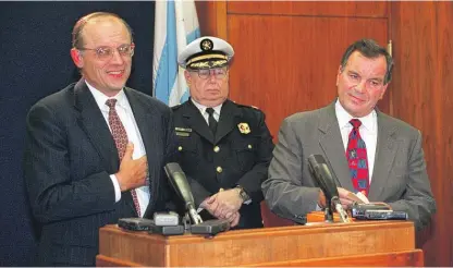  ?? SUN-TIMES FILE PHOTO ?? Jim Franczek (left) with acting fire commission­er Edward Altman and Mayor Richard M. Daley in 1997.