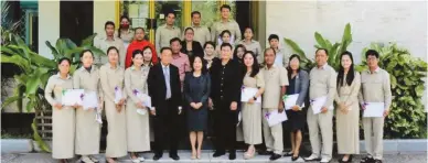  ?? ?? BREAkiNg BARRiERs The graduating class with Deputy Director general lok, Ambassador Aquino, Publico, and the cambodian senate and embassy organizing teams*