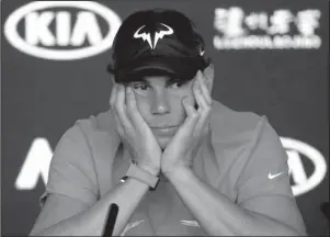  ?? The Associated Press ?? GOING UNDER: Rafael Nadal takes questions Saturday during a press conference Australian Open in Melbourne, Australia. ahead of the