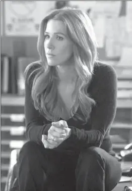  ??  ?? NEVER FORGETS: In this publicity image released by CBS, Poppy Montgomery is shown in a scene from “Unforgetta­ble.”