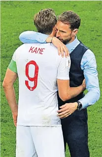  ??  ?? Dream over: England (top) salute the fans; Harry Kane (right) is consoled by Gareth Southgate; tears flow from John Stones, Harry Maguire, Marcus Rashford and Jordan Pickford, who is consoled by his family