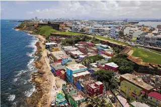  ?? Ricardo Arduengo/Associated Press ?? An aerial view of the La Perla neighborho­od in San Juan, Puerto Rico.