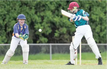  ??  ?? Noah McDonald looks to cut this wide ball during his innings of 18 not out for Yarragon Black last Monday night.