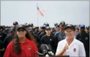  ?? KOJI UEDA — THE ASSOCIATED PRESS ?? Jennifer Appel, right, and Tasha Fuiava speak on the deck of the USS Ashland at White Beach Naval Facility in Okinawa, Japan Monday. The U.S. Navy ship arrived at the American Navy base, five days after it picked up the women and their two dogs from...