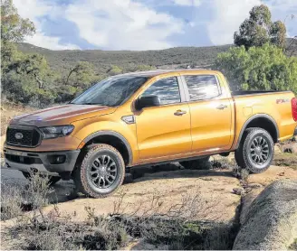  ?? Richard Russell ?? Our 2019 Ford Ranger XLT 4X4 crew cab tester was powered by a 270-horsepower (310 lb.-ft. of torque), turbocharg­ed, 2.3-litre, four- cylinder engine.