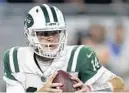  ?? JEFF HAYNES/AP ?? Dolphins safety T.J. McDonald, left, was impressed with Jets rookie quarterbac­k Sam Darnold’s 16 of 21, 198 yards and two touchdown performanc­e last Sunday.