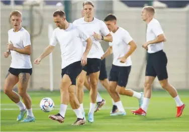  ?? Reuters ?? Players of Denmark take part in a training session ahead of their match against Australia.