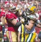  ?? HECTOR AMEZCUA/TRIBUNE NEWS SERVICE ?? 49ers tackle Joe Staley (74) fights with Packers linebacker Clay Matthews (52) in San Francisco in 2013.