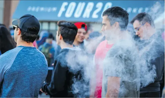  ?? AL CHAREST ?? Lineups continued Friday at Four20 Premium Market at the Southland Crossing shopping centre. The store was one of two to open following this week’s legalizati­on of cannabis.