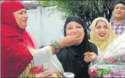  ?? SUBHANKAR CHAKRABORT­Y/HT ?? Shaista Amber, president of All India Muslim Women Personal Law Board, celebrates the verdict in Lucknow.