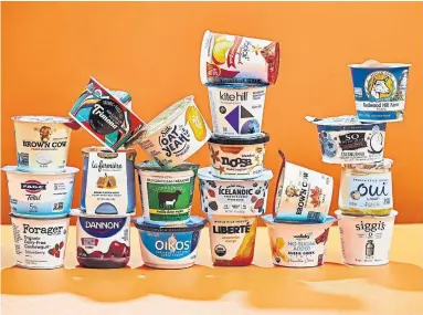  ?? TOM MCCORKLE PHOTOS THE WASHINGTON POST ?? Grab a spoon. It's time to make sense of some of the terminolog­y behind the 300 options in the yogurt aisle.