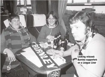  ??  ?? Looking relaxed: Burnley supporters on a League Liner