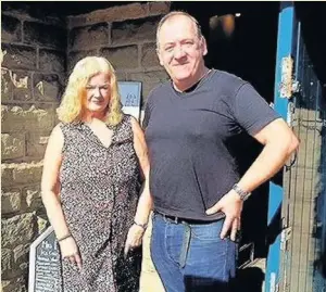  ??  ?? ●● Beryl and Stephen Cumming have vowed to carry on running The Clough Head Cafe on Grane Road, Haslingden, after intruders ransacked the building