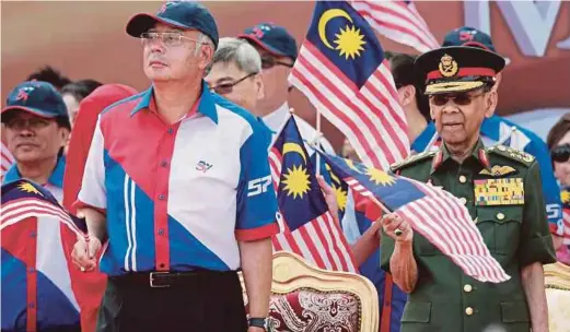  ?? FILE PIC ?? Prime Minister Datuk Seri Najib Razak and Sultan Abdul Halim Mu’adzam Shah at the 57th National Day celebratio­n in Kuala Lumpur on Aug 31, 2014.