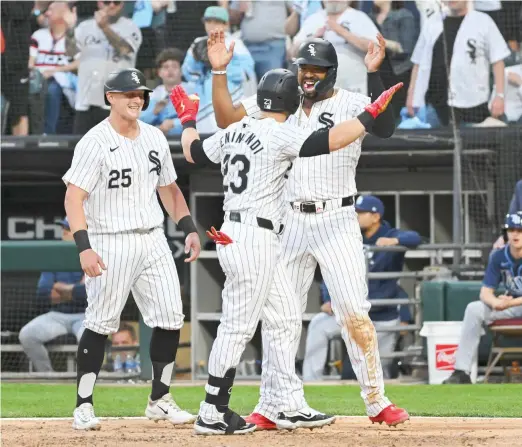  ?? GETTY IMAGES ?? Eloy Jimenez (right), who homered Friday, has been on a tear at the plate. He has turned things on since April 20 and had two more hits Saturday.