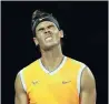  ?? PHOTO: REUTERS ?? Rafael Nadal grimaces after he conceded a point during the Australian Open final on Sunday night.