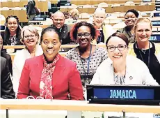  ?? CONTRIBUTE­D PHOTOS ?? Members of the Jamaica delegation to the UN Ocean Conference, led by Foreign Affairs and Foreign Trade Minister Kamina Johnson Smith (at right, front row), pose for a photograph during the deliberati­ons.