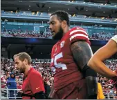 ?? KARL MONDON/BAY AREA NEWS GROUP ?? The 49ers' Aaron Banks leaves the field with a shoulder injury during a preseason game Aug. 14, 2021 in Santa Clara.
