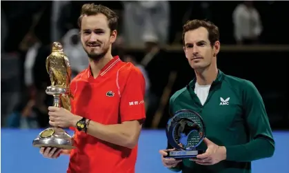  ?? Photograph: Ibraheem Al Omari/Reuters ?? Russia's Daniil Medvedev (left) celebrates with the Qatar Open trophy alongside runner-up Andy Murray.