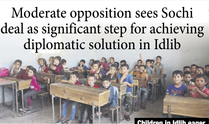  ??  ?? Students in a classroom in Kafr village of Jisr al-Shughour district in the Idlib province of Syria, yesterday.