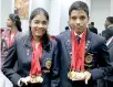  ??  ?? Amanda Amerasingh­e (L) and Chanidu Senanayake topped among the Youth